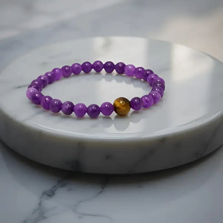 Purple beaded Amethyst Stretch Bracelet with golden accent from Bec Sue Jewelry