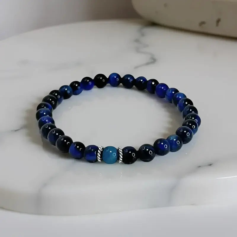 Blue and black beaded Blue Tiger Eye bracelet showcasing eye bracelet beaded jewelry