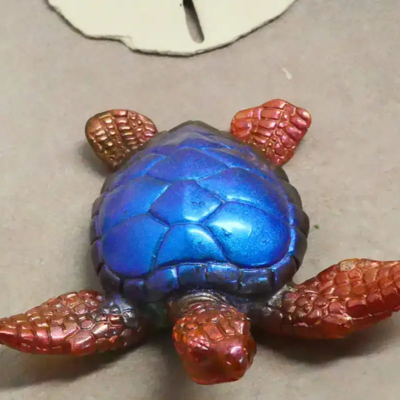 Iridescent blue and copper turtle figurine ideal for beads, bracelets, and home decor