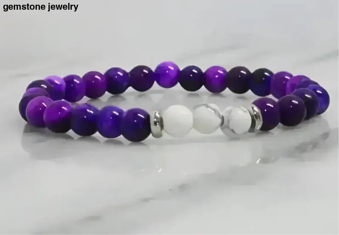Purple and white howlite stretch bracelet with metallic accents for stylish accessory