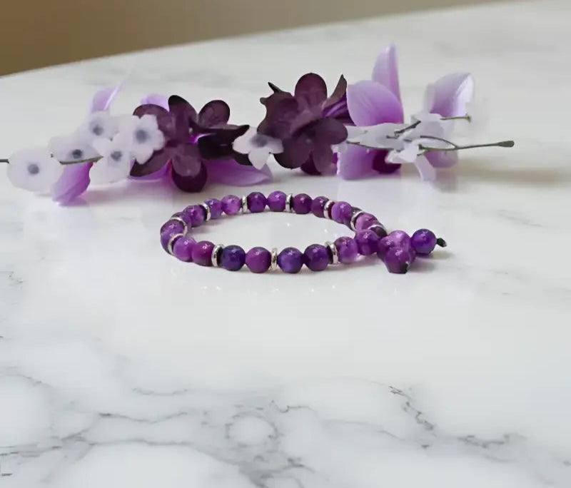 Purple Sugilite Gemstone Bracelet with 8mm round stones in custom gemstone bracelets design
