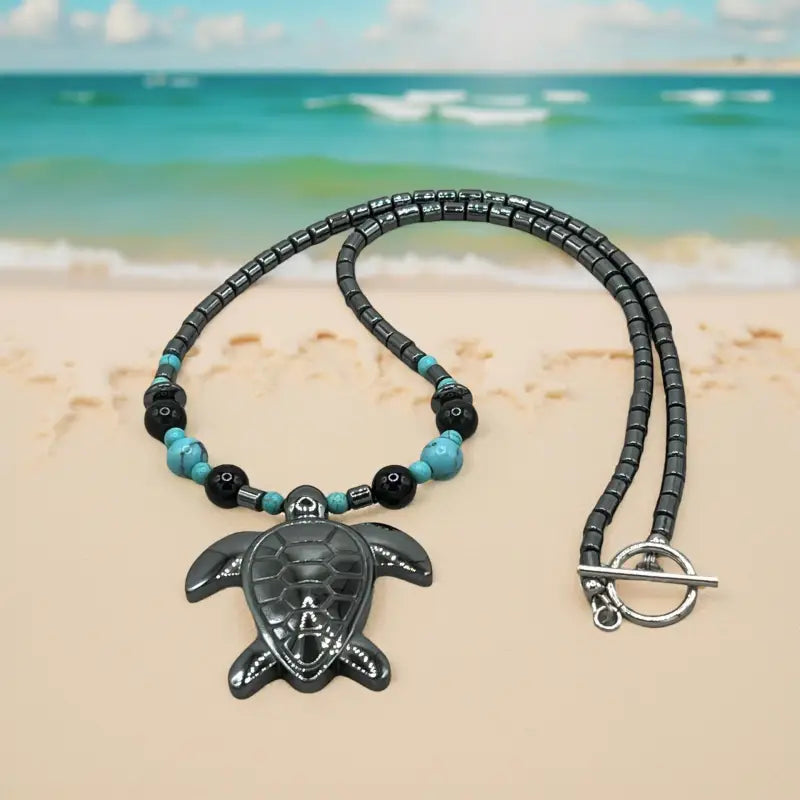 Turquoise Bead Necklace and Bracelet Set with Sterling Silver Turtle Pendant showcased