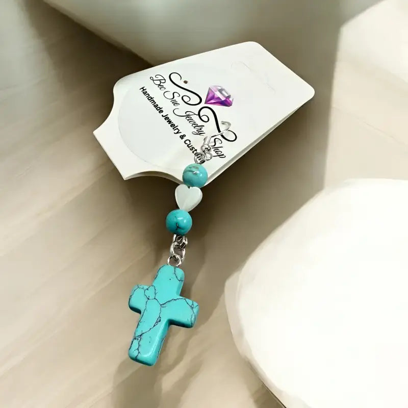 Turquoise cross pendant with beads for heart shape inspired turquoise earrings display