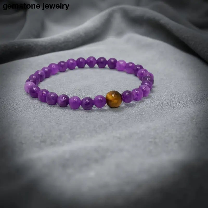 Amethyst Stretch Bracelet with Brown Accent from Bec Sue Jewelry showcasing unique design