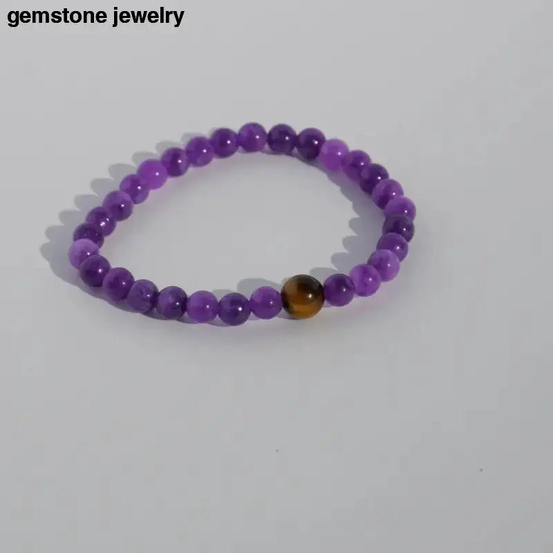 Amethyst Stretch Bracelet with Purple Beads and a Brown Accent Bead - Bec Sue Jewelry Shop