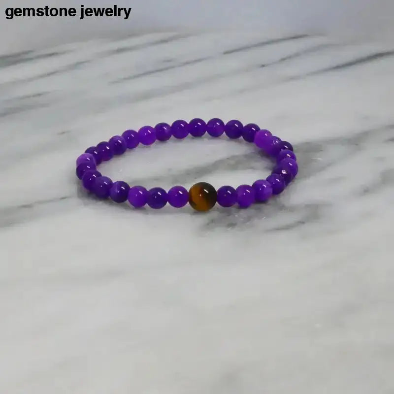 Amethyst Stretch Bracelet with Purple Beads and a Brown Accent Bead - Bec Sue Jewelry Shop