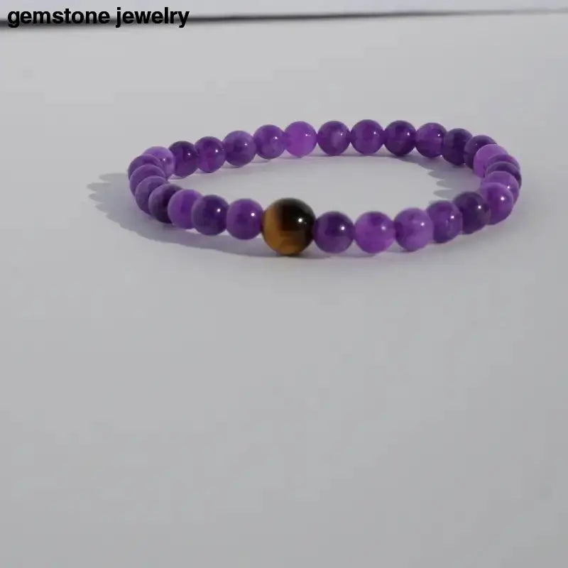 Amethyst Stretch Bracelet with Purple Beads and a Brown Accent Bead - Bec Sue Jewelry Shop