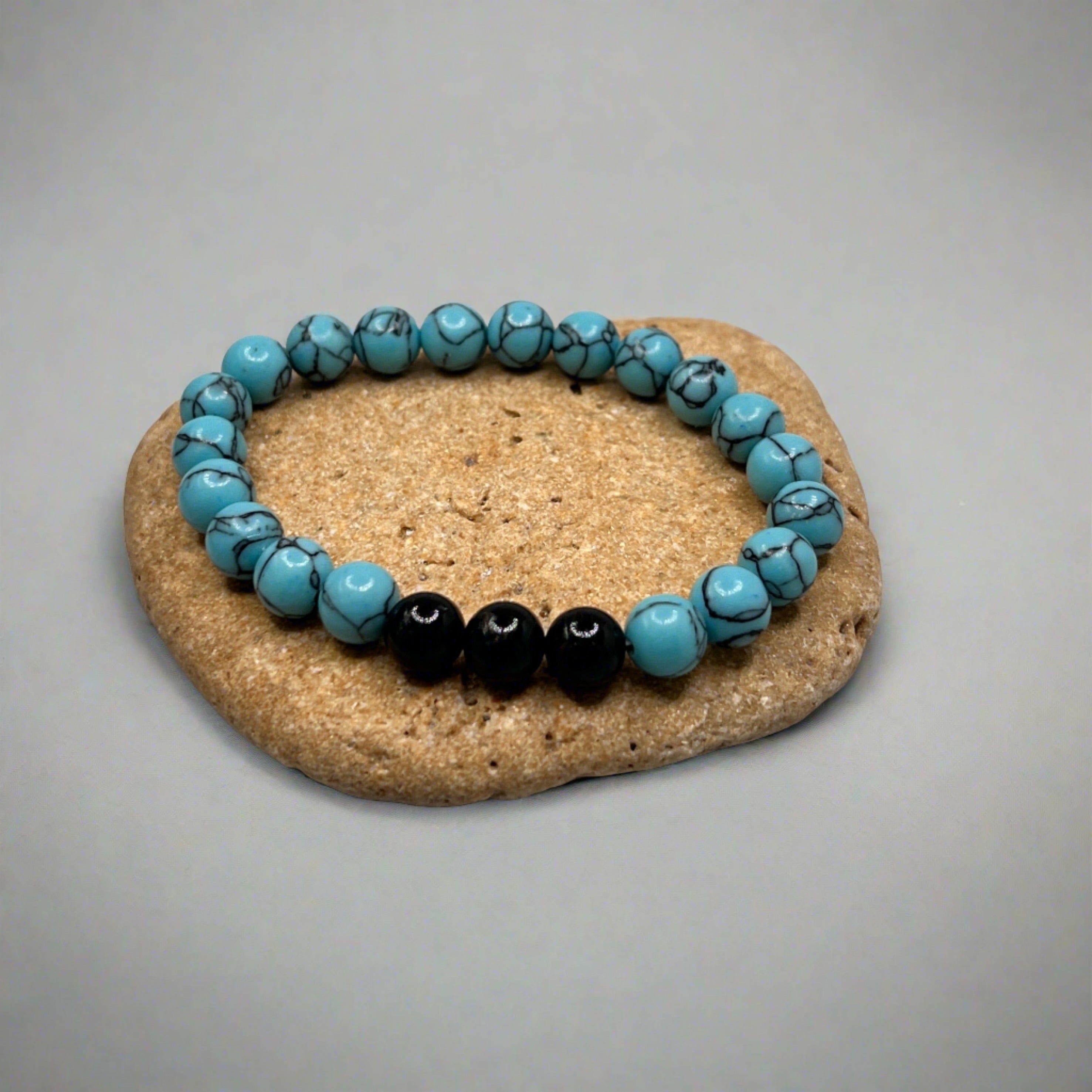 Handmade beaded bracelet with striking turquoise gemstone accents