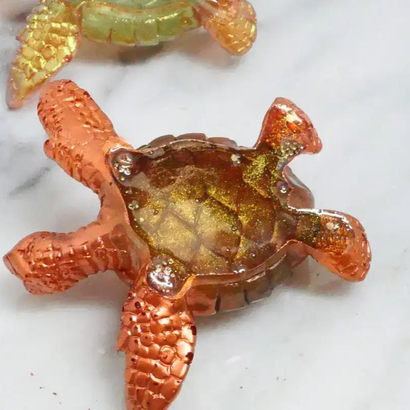 Orange and gold resin turtle figurine perfect for beads, bracelets, and home decor