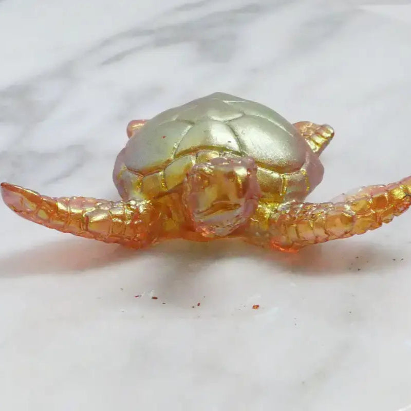 Iridescent turtle figurine perfect for beads, bracelets, and home decor accessories
