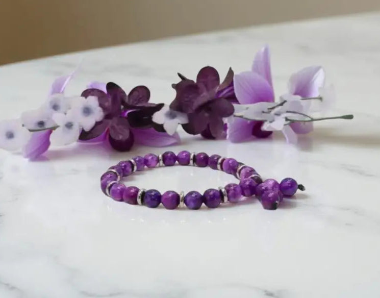 Purple Sugilite Gemstone Bracelet with 8mm round stones in custom gemstone bracelets design