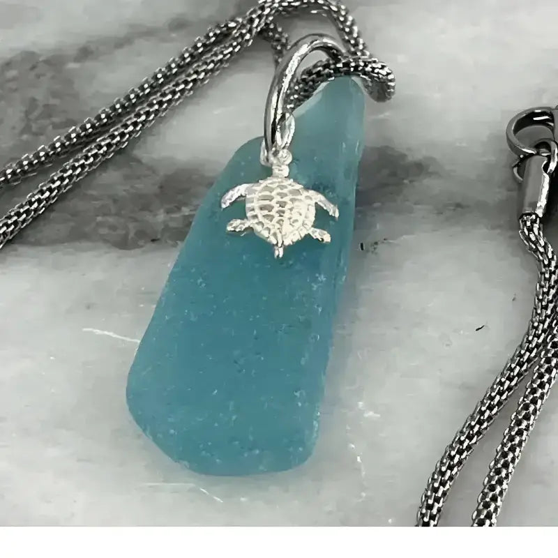 Blue sea glass turtle pendant necklace with gemstone charm, perfect for Bec Sue Jewelry