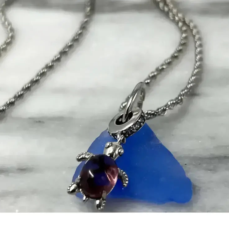 Silver sea glass turtle pendant necklace with blue glass charm in Bec Sue Jewelry