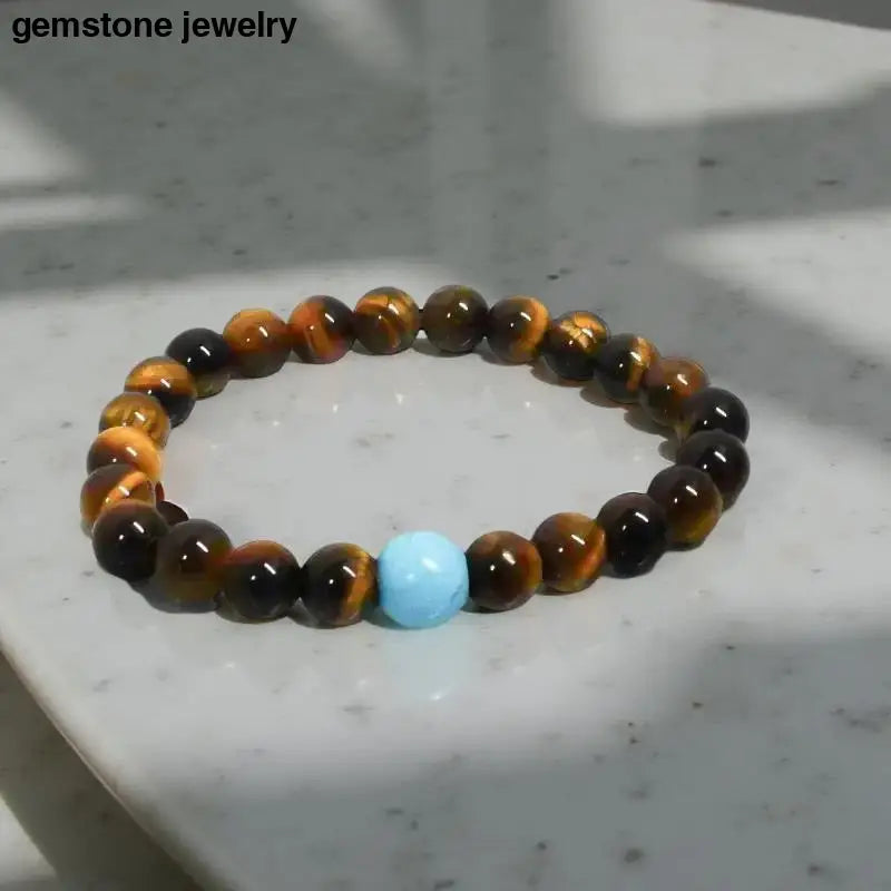 Beaded Tiger Eye Bracelet with Turquoise Accent for Men showcasing stylish elegance