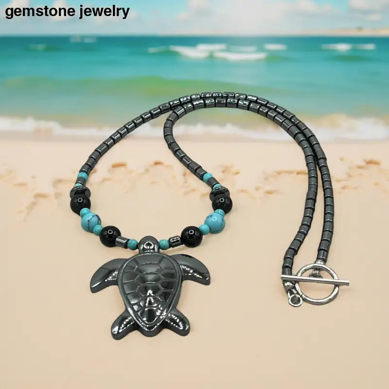 Turquoise Bead Necklace and Bracelet Set with Sterling Silver Turtle Pendant showcased