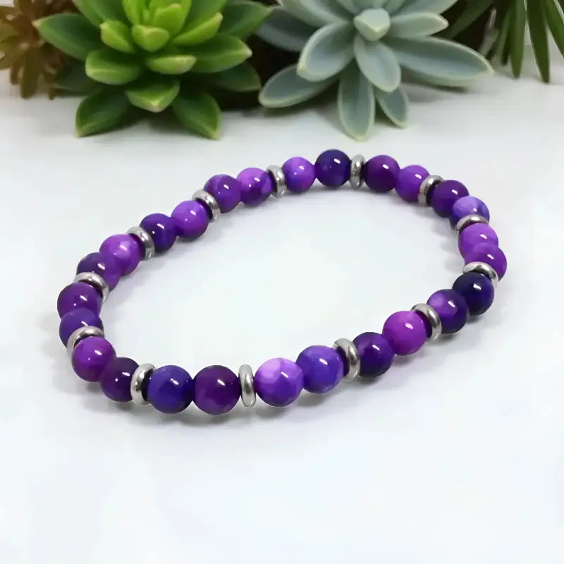 Purple crystal bracelet with sugilite 6mm beads and silver spacers, unique handmade jewelry